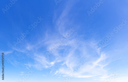 Blue sky and light thin clouds. Feather clouds.