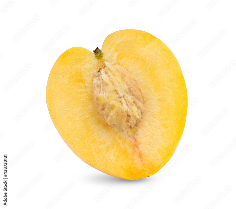 half yellow nectarine isolated on white