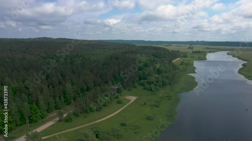 Dense Forest At The Edge Of The Neman River In Rambynas Regional Park - aerial shot photo