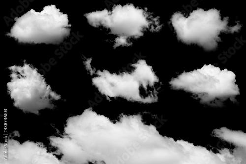 Set of isolated clouds on black background.