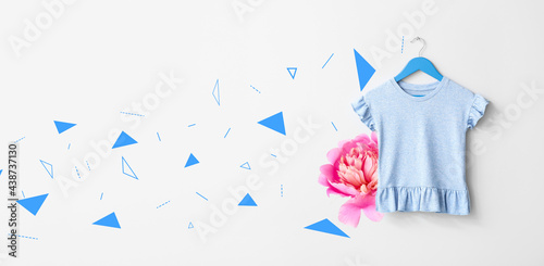 Hanger with t-shirt on whit...