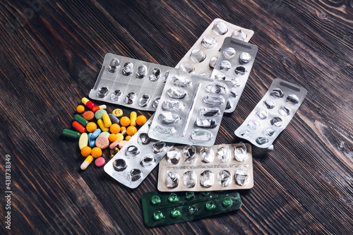 Many different pills on woo...