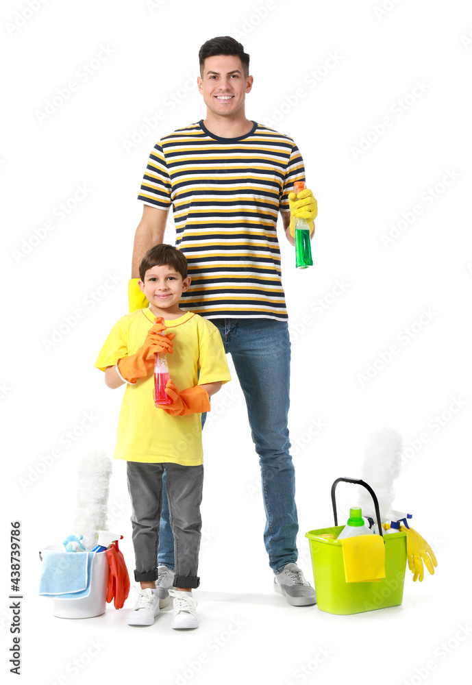 Father and son with cleaning supplies on white background Father and son with cleaning supplies on white background