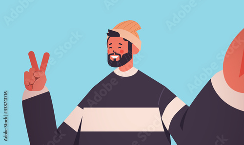 happy man taking selfie on smartphone camera in hand casual guy making self photo horizontal