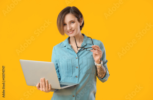 Female programmer with lapt...