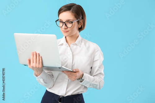 Female programmer with lapt...