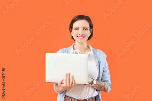 Female programmer with lapt...