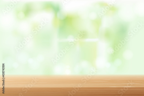 Wood table top blur Behind the window in the room white and green background.
It can be used to display merchandise, food, other products.