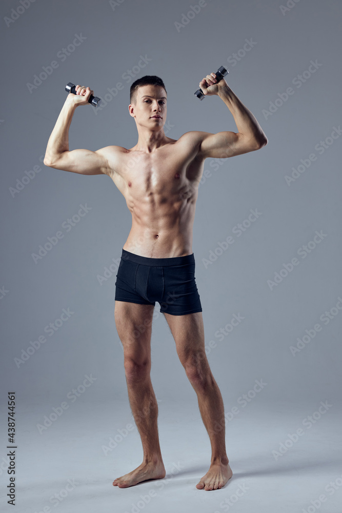 bodybuilder with dumbbells in hands pumped up body workout exercise isolated background bodybuilder with dumbbells in hands pumped up body workout exercise isolated background