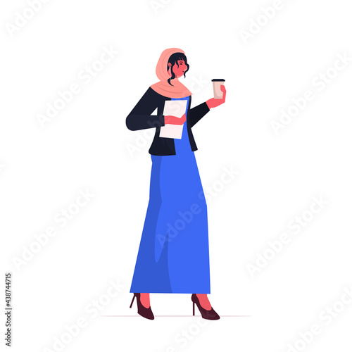 arab businesswoman leader in formal wear drinking coffee successful business woman standing pose leadership