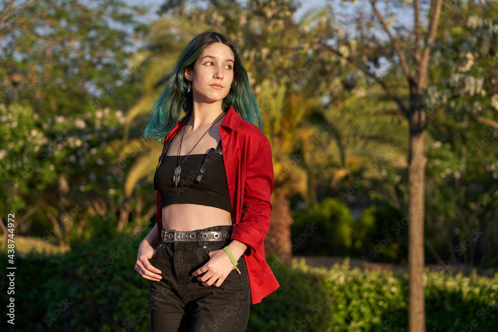 Caucasian, modern young woman with colored hair Caucasian, modern young woman with colored hair