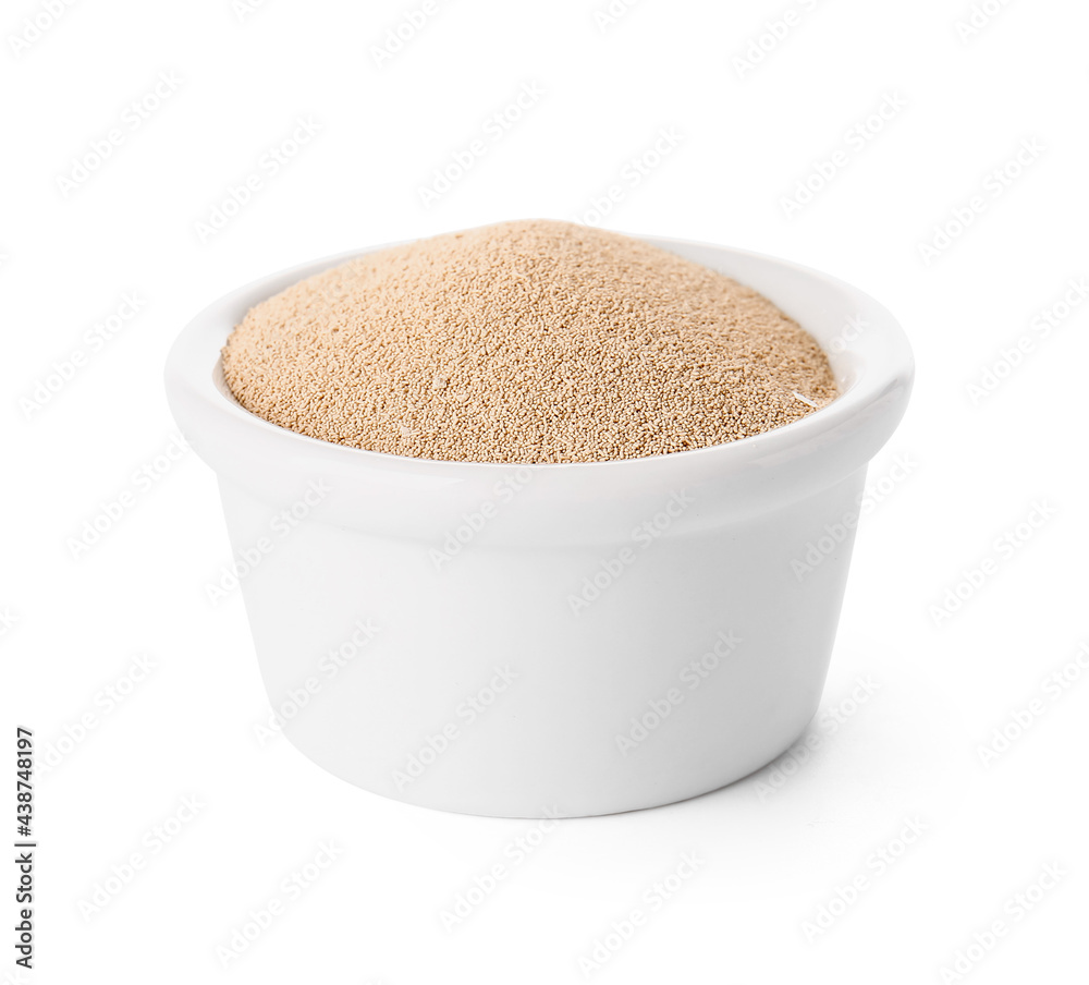Bowl with active dry yeast on white background Bowl with active dry yeast on white background