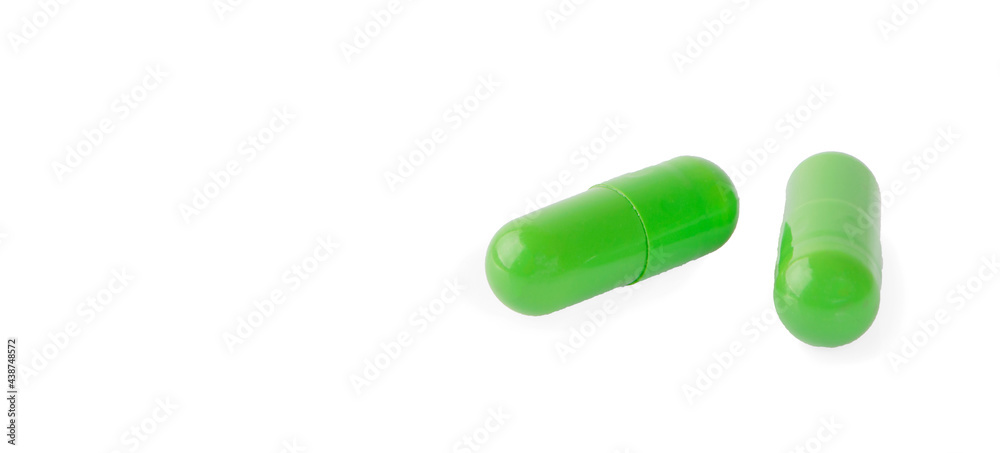 ginkgo biloba capsule green pills isolated on white background