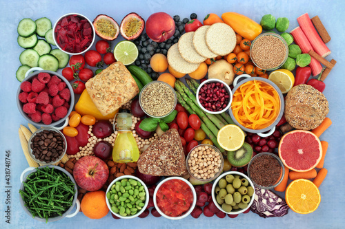 Fototapeta Naklejka Na Ścianę i Meble -  Healthy vegan plant based fruit and vegetable collection high in antioxidants. Health food concept foods high in fibre, anthocyanins, vitamins, omega 3, lycopene, protein, carotenoids and protein.