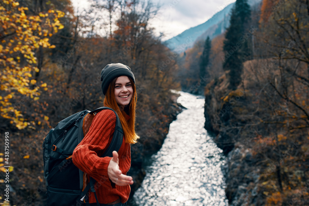 cheerful woman hiker mountains river landscape travel