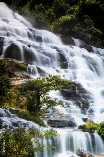 Beautiful waterfall in green forest in jungle at Ching Mai  Thailand