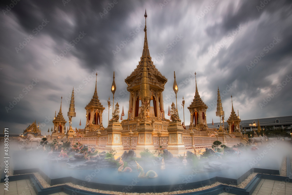 Fototapeta premium Royal crematorium. The royal pyre for royal funeral of H.M. King Bhumibol Adulyadej at Sanamlaung, Bangkok, Thailand. Long exposure, Moving crowd.