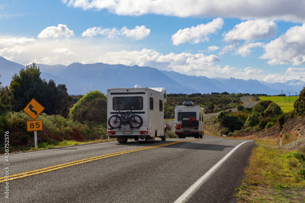 Recreational vehicles on the road between Te Anau and Milford Sound in the South Island of New Zealand Recreational vehicles on the road between Te Anau and Milford Sound in the South Island of New Zealand