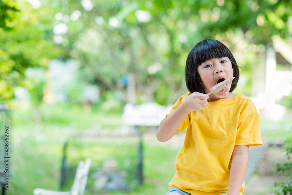 kid eating ice cream, delicious and happy concept kid eating ice cream, delicious and happy concept
