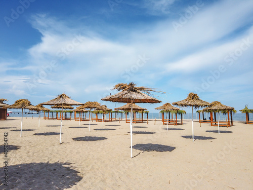 Beach with umbrellas at the Bulgarian Black Sea coast.Burgas Beach.