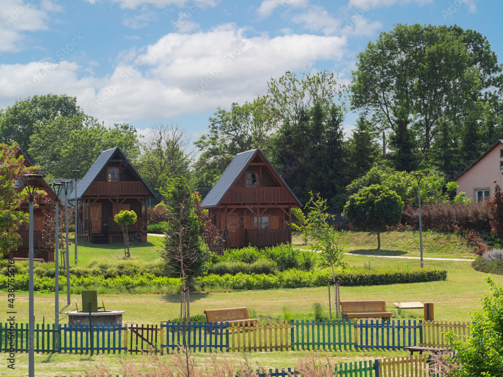 wooden summer houses by the lagoon