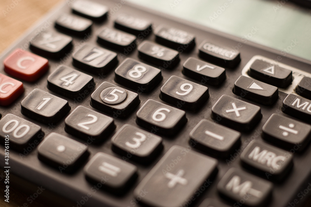 Black calculator on texture background stock image. Black calculator on texture background stock image.