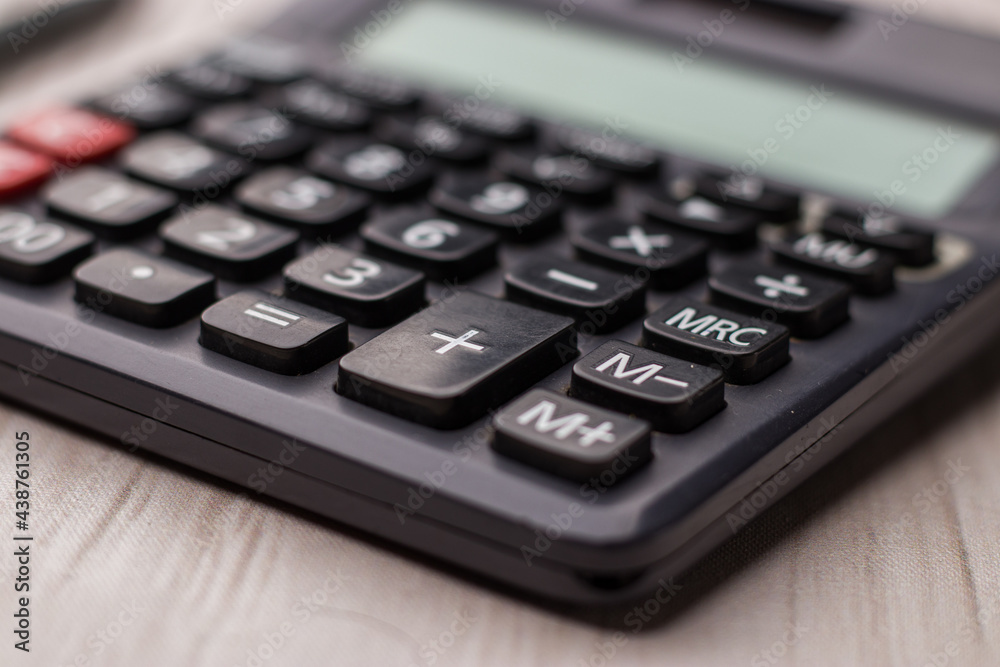 Black calculator on texture background stock image. Black calculator on texture background stock image.