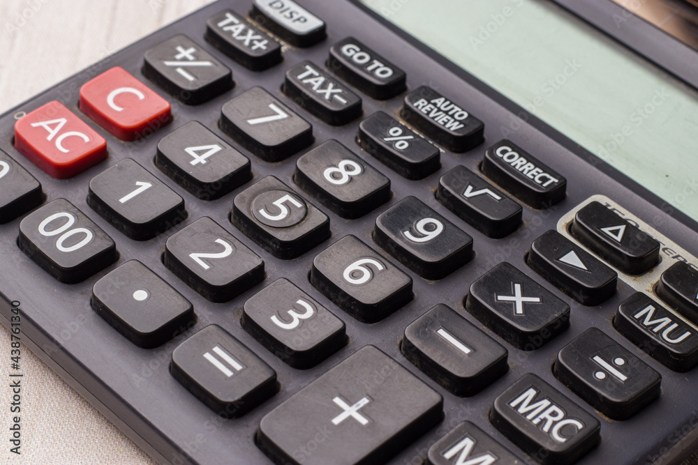 Black calculator on texture background stock image. Black calculator on texture background stock image.