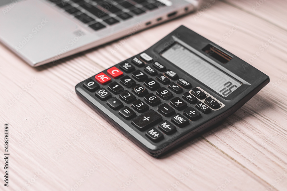 Black calculator on texture background stock image. Black calculator on texture background stock image.