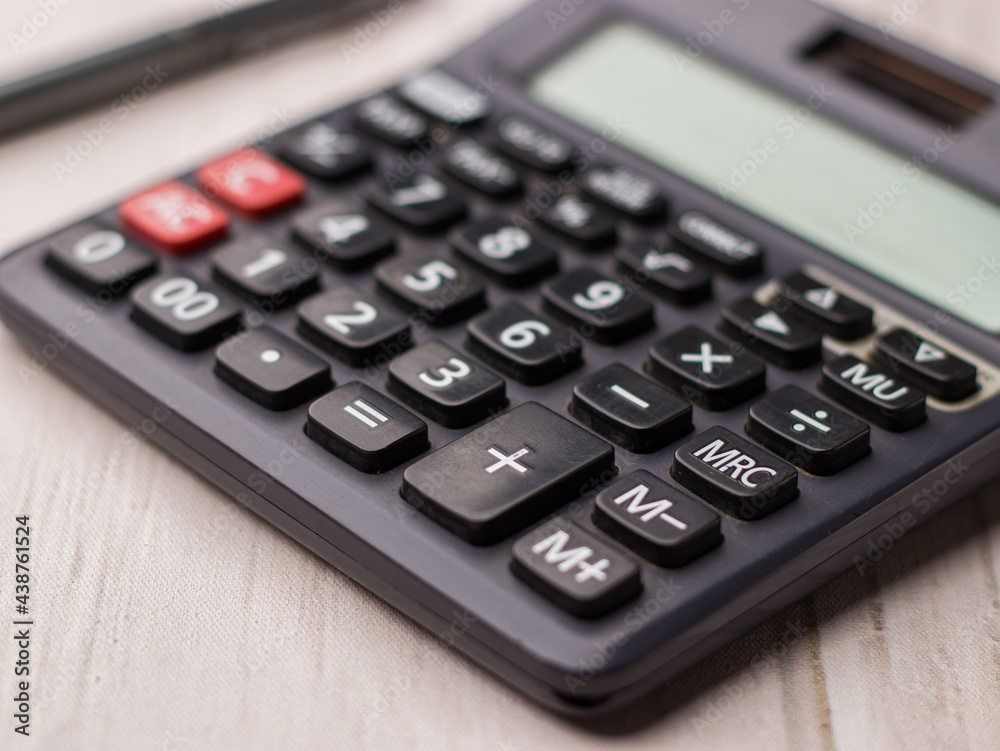 Black calculator on texture background stock image. Black calculator on texture background stock image.