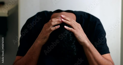 Anxious hispanic man feeling worry and PREOCCUPATION