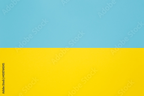 Two-color background made with horizontal line. Yellow and light blue colorway