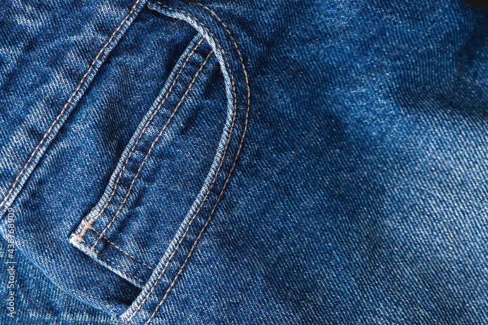 Close Up of Blue Denim Jean Texture with Back Pocket Detail. Close up of blue jeans cloth.. Close Up of Blue Denim Jean Texture with Back Pocket Detail. Close up of blue jeans cloth..