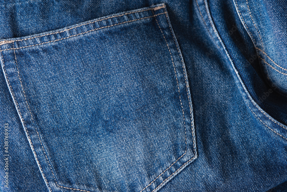 Close Up of Blue Denim Jean Texture with Back Pocket Detail. Close up of blue jeans cloth.. Close Up of Blue Denim Jean Texture with Back Pocket Detail. Close up of blue jeans cloth..