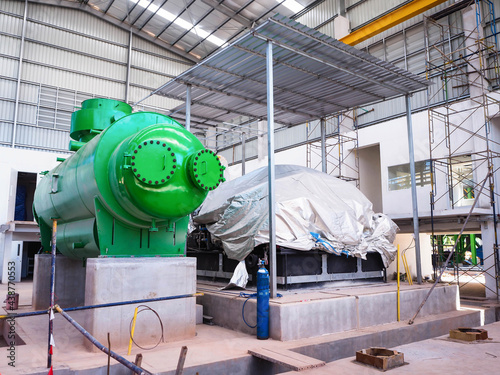 Condenser tank was lifting in power plant during construction. photo