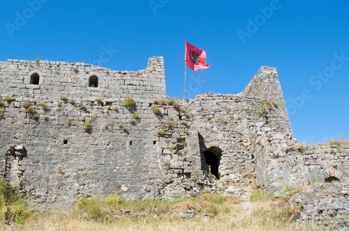 Castle Old Walls and Albanian Flag. Shkodër, Albania photo