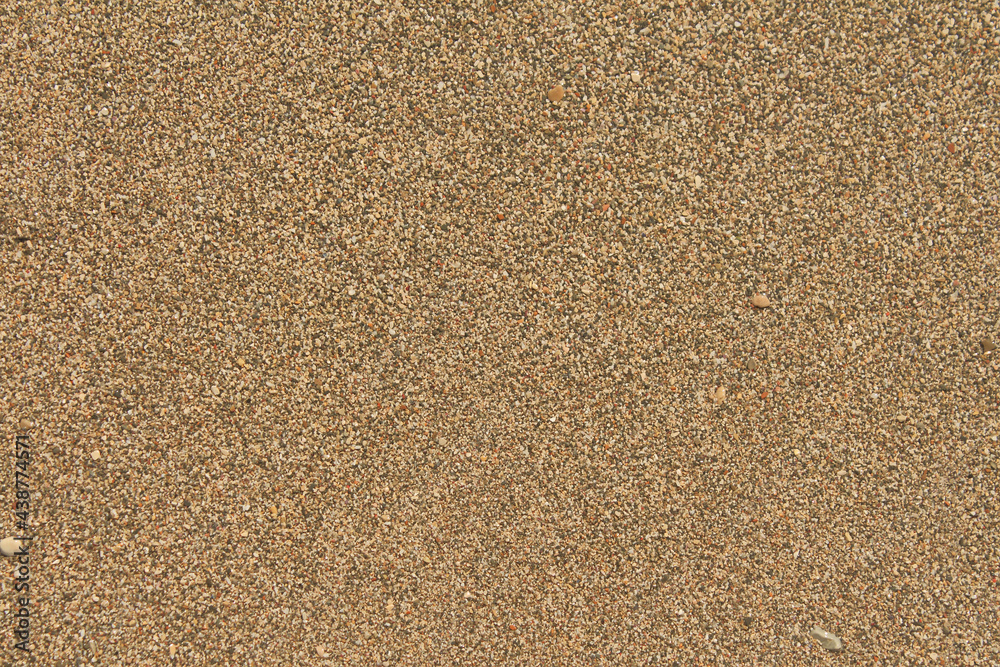 Sand pebble texture. Brown beach sand background. Sand pebble texture. Brown beach sand background.