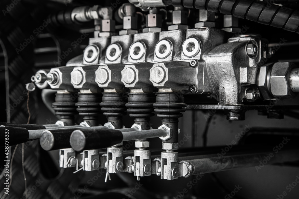 compressor control unit and actuators for lifting and lowering machine ...