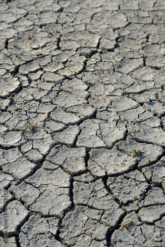 A close-up on cracked earth. Guérande, France, June 2021. 