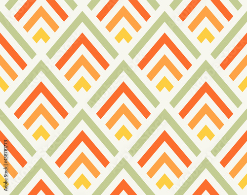 Seamless pastel pattern. Rhombus. Scandinavian style. Geometric background for wrapping paper or cards. Textile design. Wallpaper. Olive color, orange, yellow.