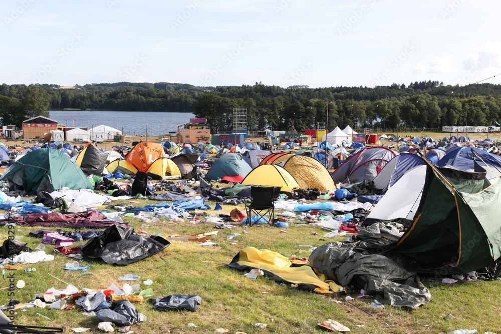 Field and tent village after a rock festival in Skanderborg, Denmark - obrazy, fototapety, plakaty 