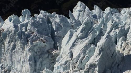 Jagged unique shapes of a Glacier in Alaska. photo