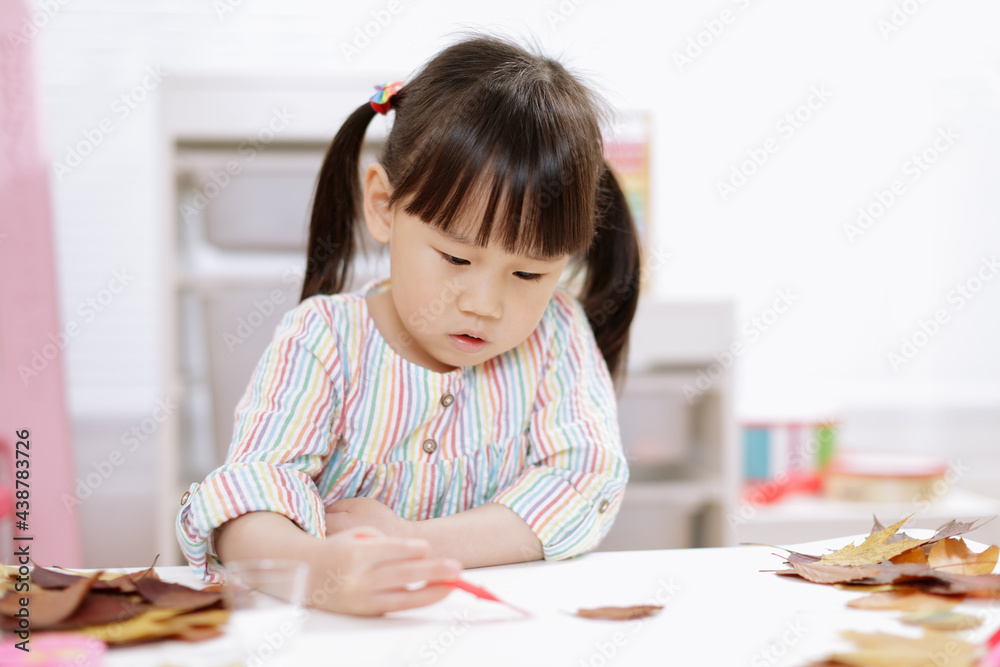 young girl making craft for homeschooling young girl making craft for homeschooling