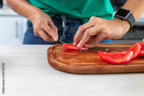 concasse tomato peeling technique on a wooden table photo