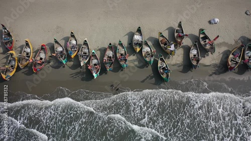 Aerial view of traditional fishing boats along the shoreline on the beach on St. Martin's Island, Teknaf, Chittagong, Bangladesh. photo