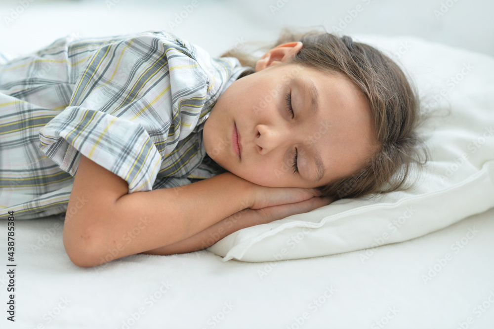 Porait of cute little girl sleeping in bed at home Porait of cute little girl sleeping in bed at home
