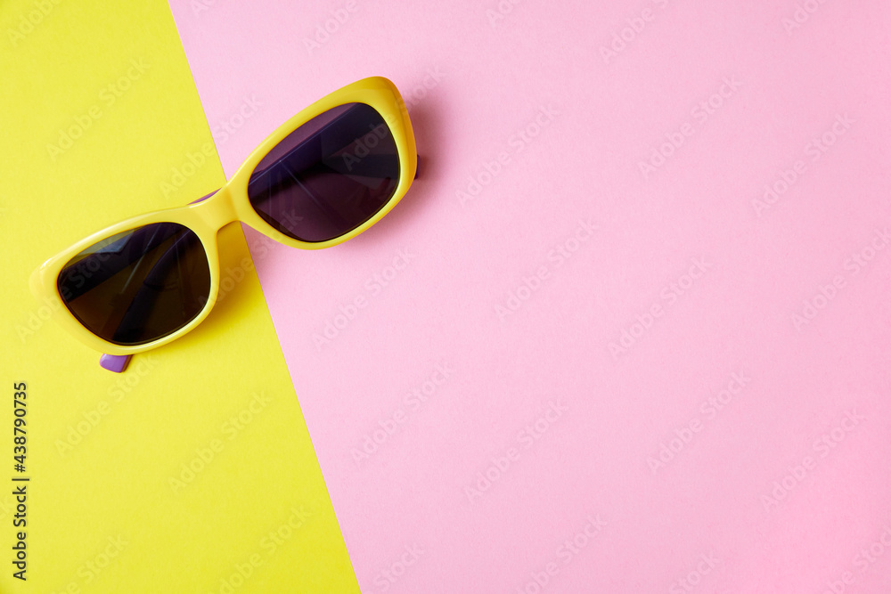 Sunglasses on minimal colorful background with copy space Sunglasses on minimal colorful background with copy space