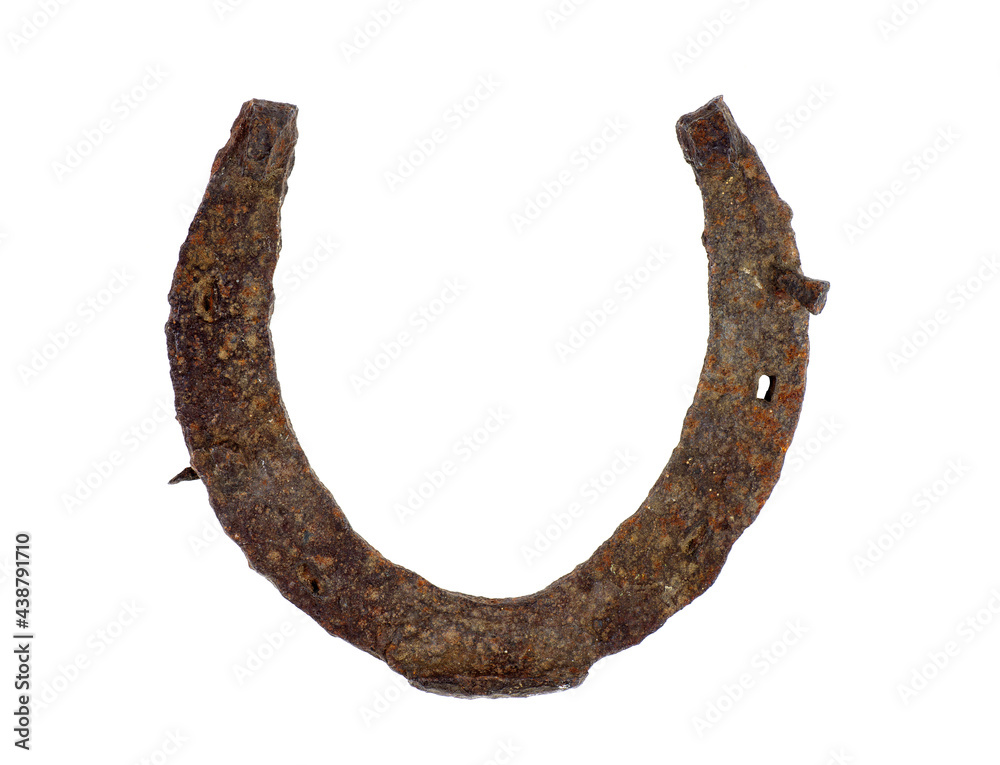 Old rusty horseshoe isolated on white background
