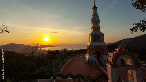 .timelapse stuning sky at sunset behind beautiful pagoda..Sunset over ocean. Scene of Colorful romantic sky sunset, Summer and travel vacation concept.. photo