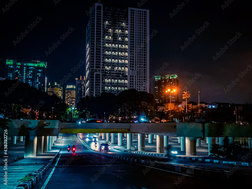 The Kemayoran Underpass, located in Kemayoran, Central Jakarta, Indonesia - on June 7, 2021, looks beautiful when seen at night. This underpass is like a rat's path for the residents here, 